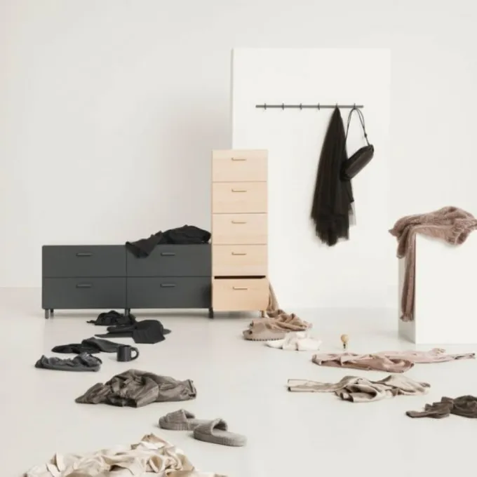 One low and one tall Relief drawer with legs